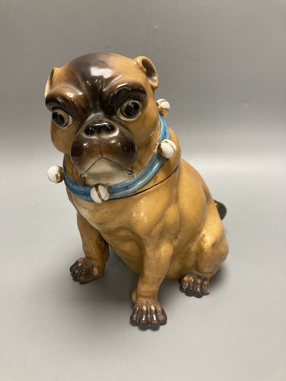 A German porcelain pug tobacco jar and cover, late 19th century, height 18.5cm